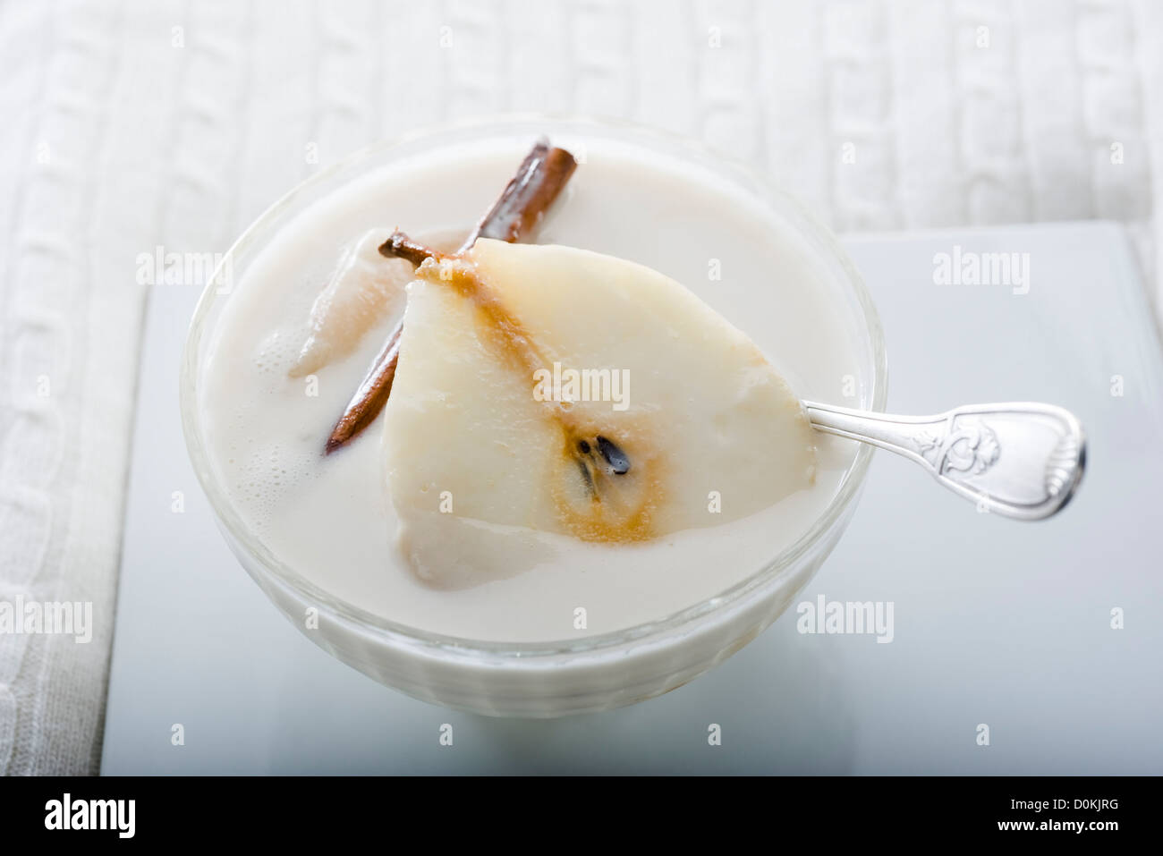 Pere cotto in latte di cocco Foto Stock