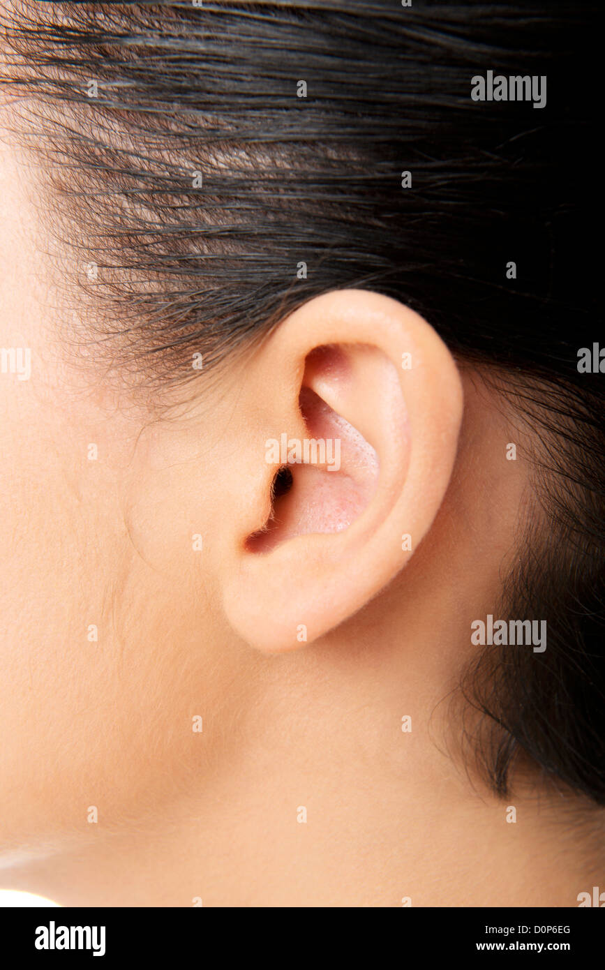 Giovane donna orecchio closeup Foto Stock
