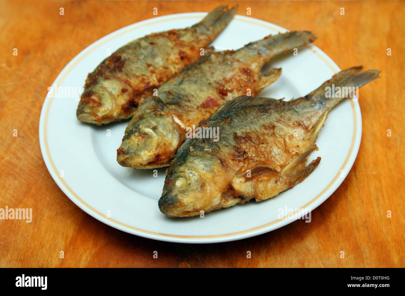 Pesce fritto carassio Foto Stock