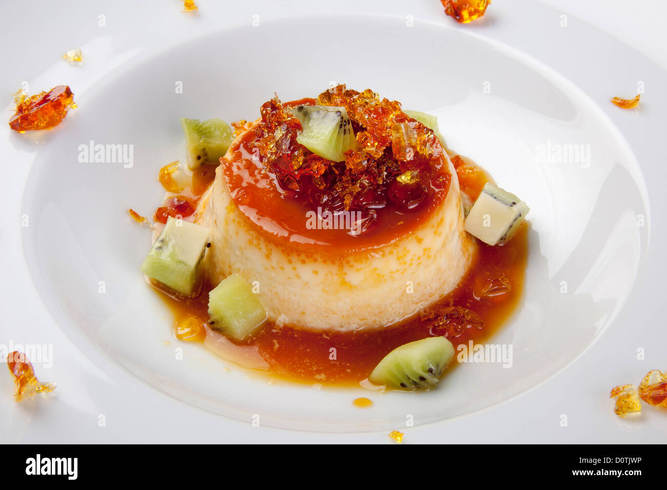 La gelatina dolce con crema pasticcera e kiwi Foto Stock