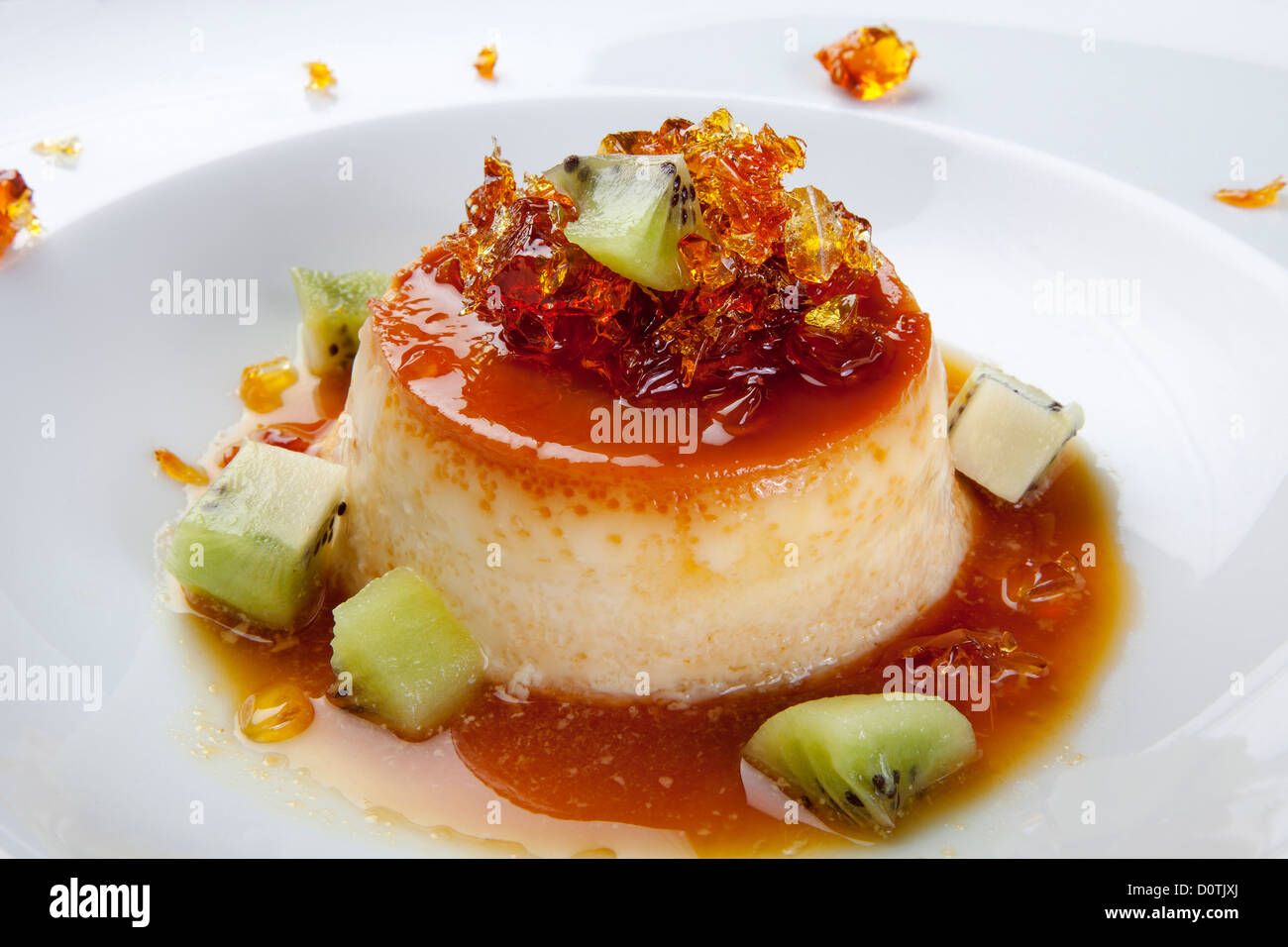 La gelatina dolce con crema pasticcera e kiwi Foto Stock