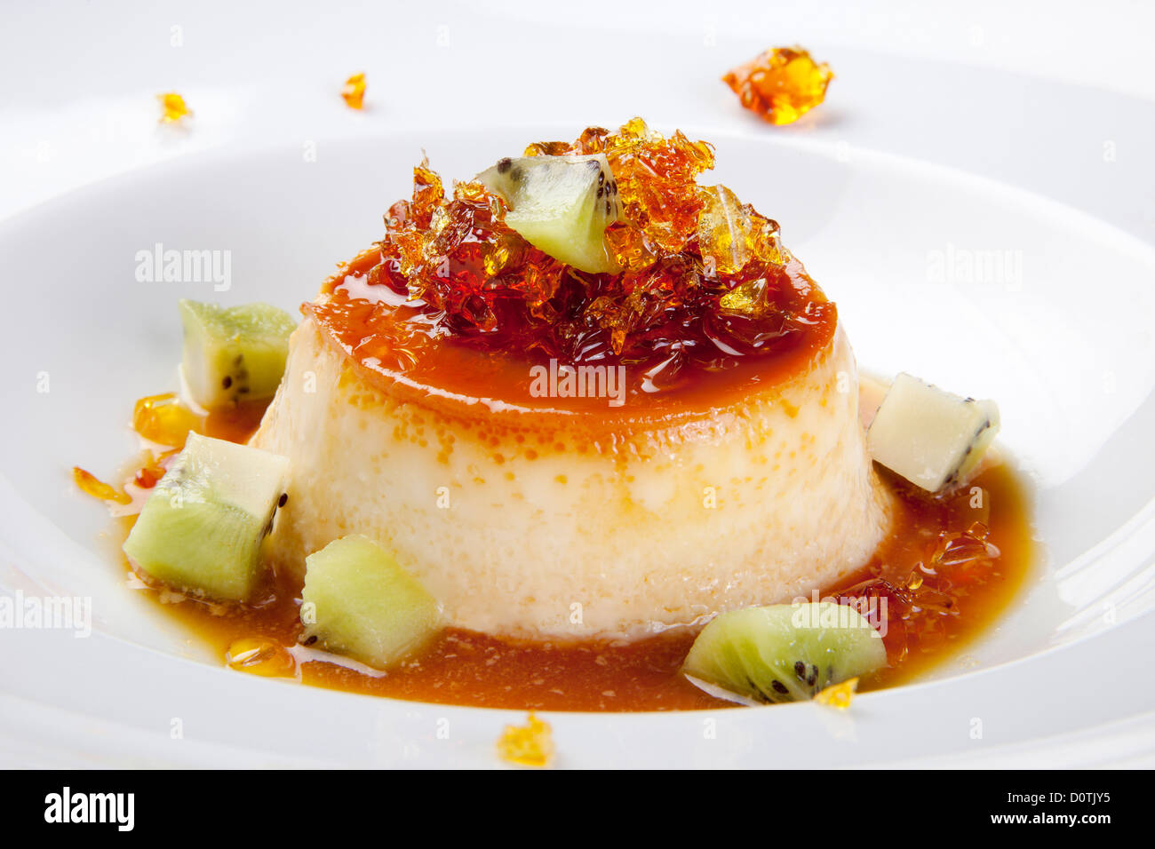 La gelatina dolce con crema pasticcera e kiwi Foto Stock