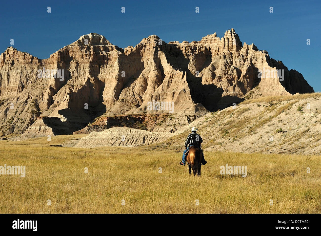 American Indian, cavallo, equitazione, cowboy, badlands Lakota, Sioux, Indiana, Badlands, South Dakota, solitarie, cavaliere, West, p Foto Stock