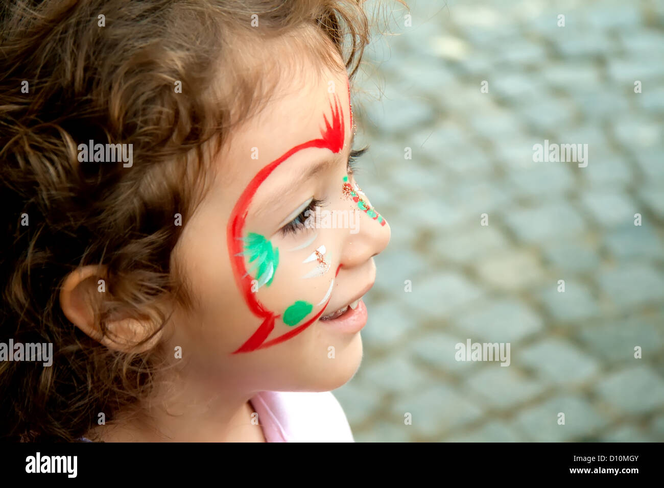 Bambina con la faccia della vernice Foto Stock
