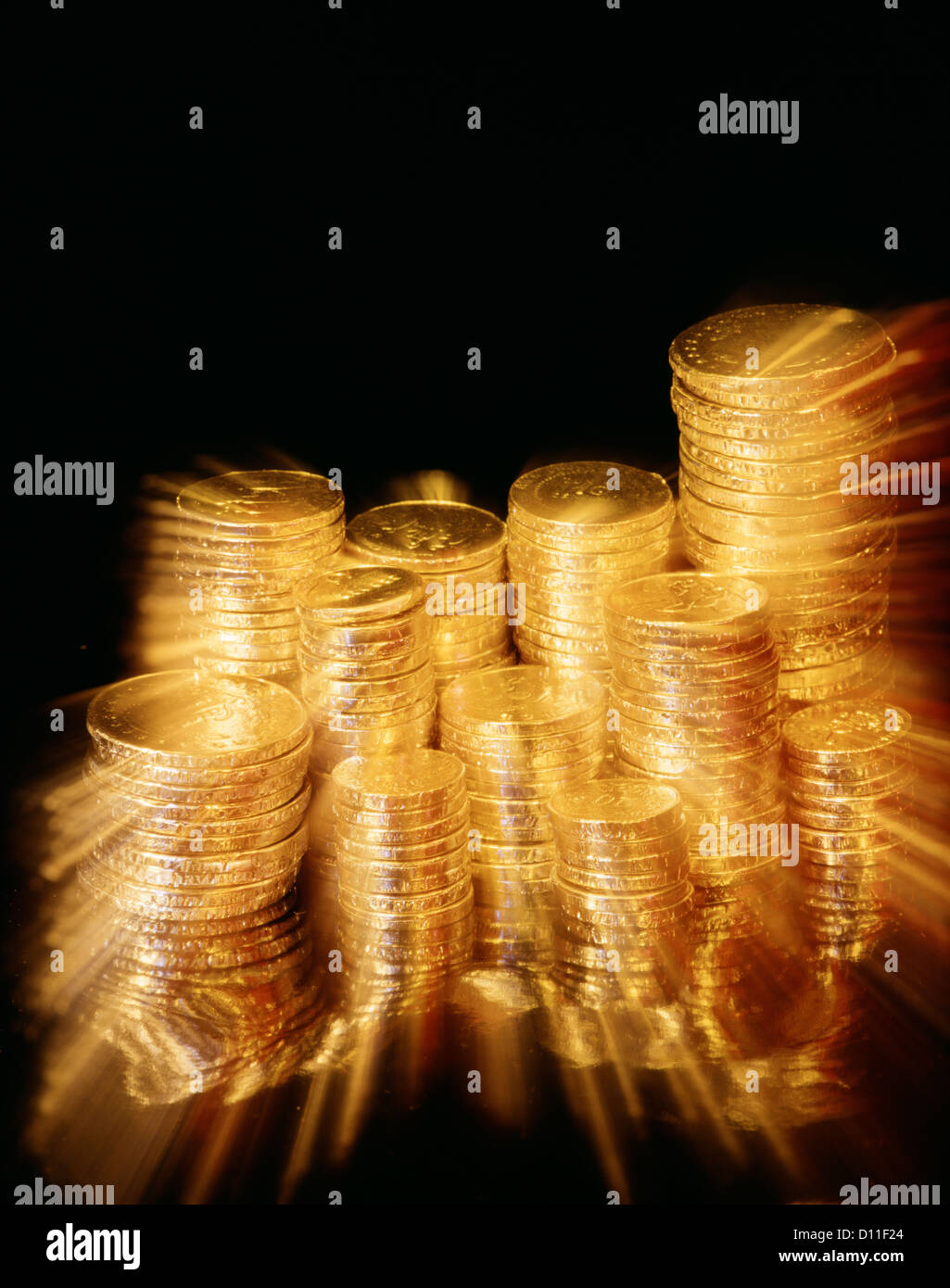 Effetto di zoom di pile di caramelle oro monete Foto Stock