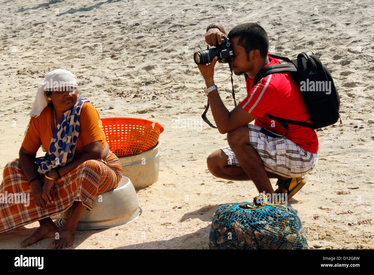 Fotografo in un divertente scenario; kovalam kerala Foto Stock