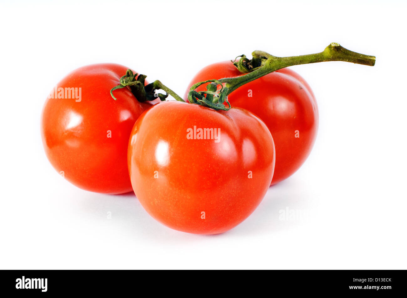 Mazzetto di tre pomodoro su sfondo bianco Foto Stock