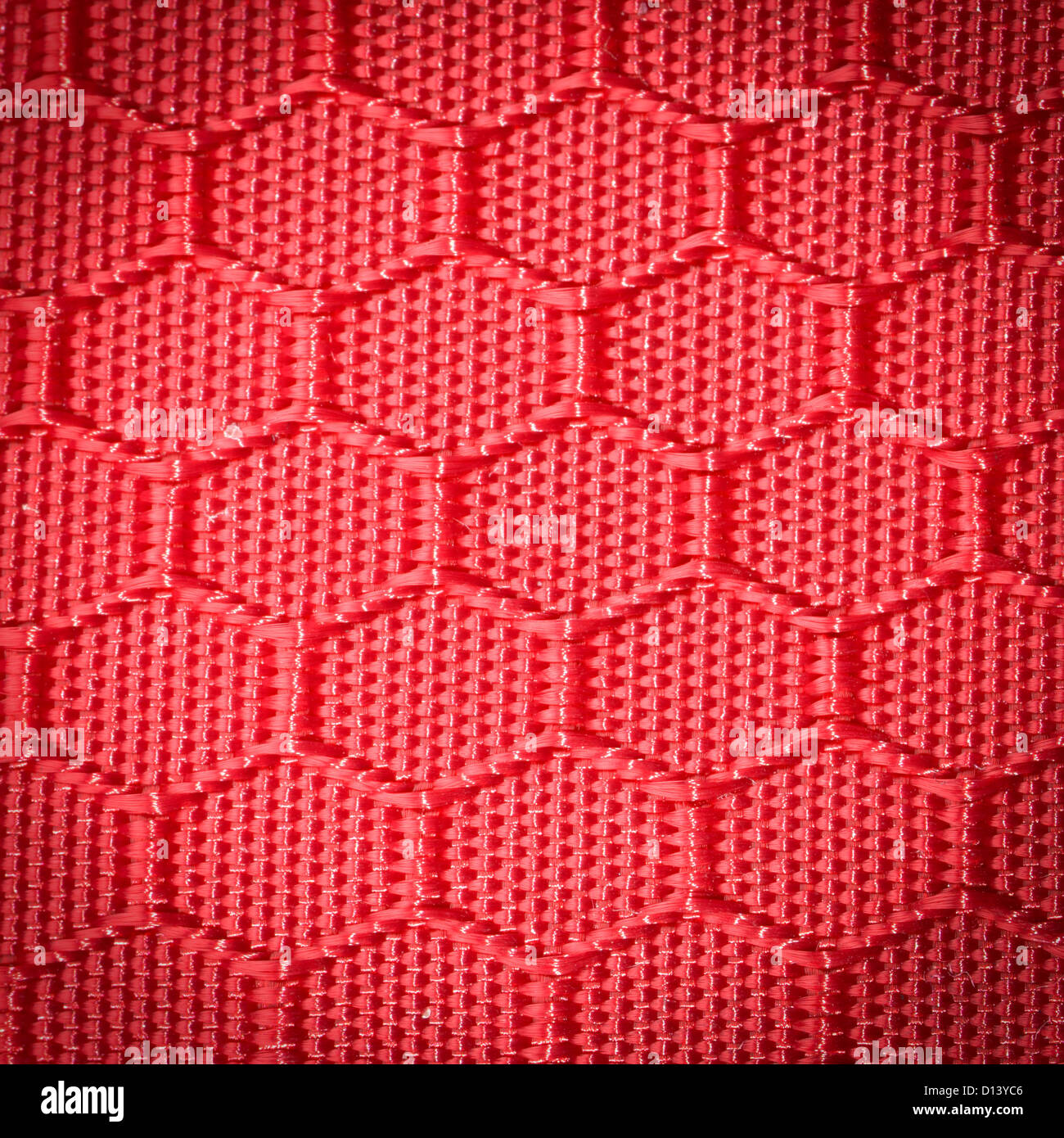Nido maglia texture di panno rosso Foto Stock