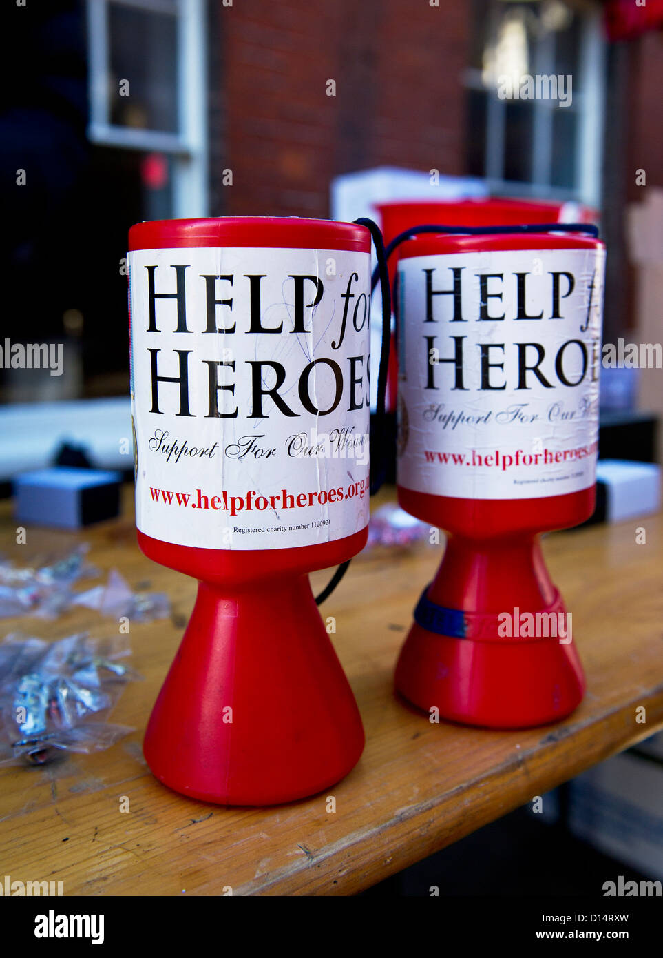 Scatole di raccolta per aiutare per gli eroi della carità. Foto Stock