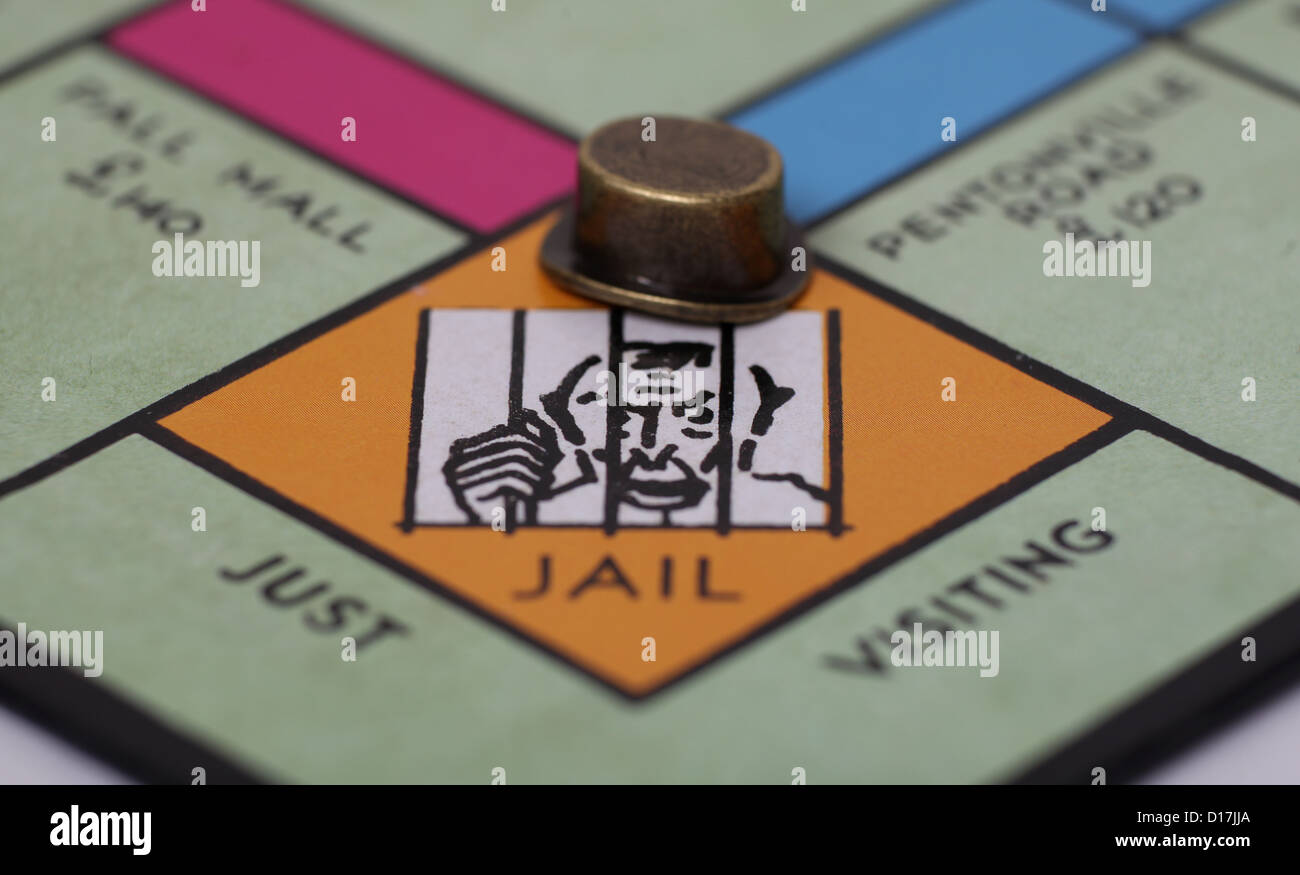 Monopolio nel Carcere Piazza con parte superiore era giocatori pezzo. Foto Stock