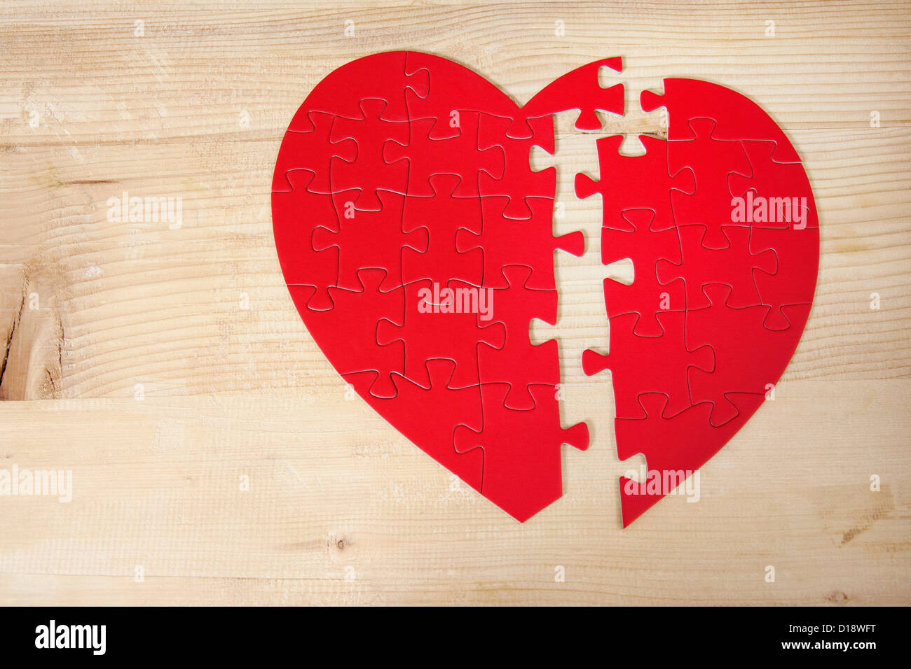 A forma di cuore ad puzzle Foto Stock