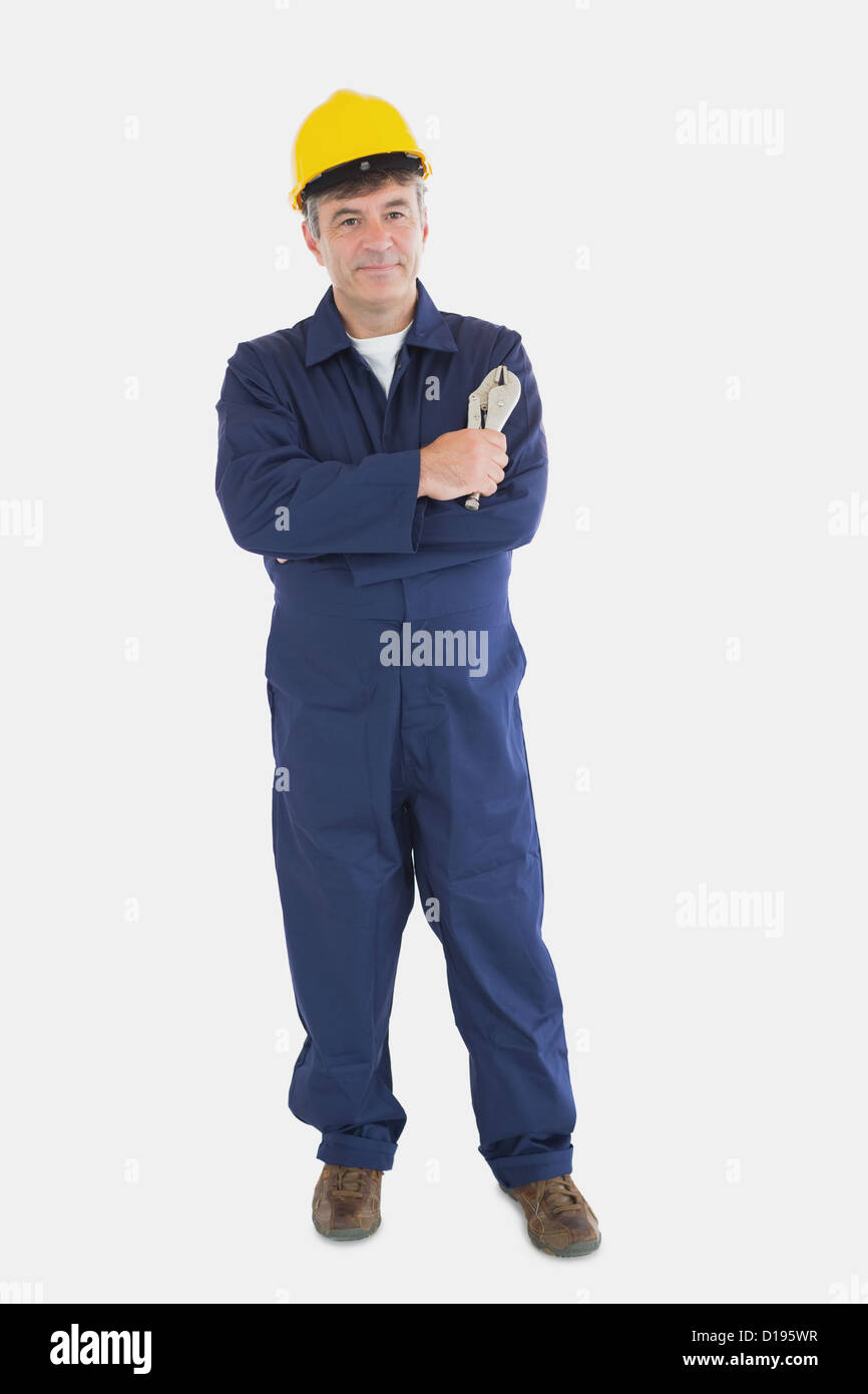 Meccanico con un hardhat azienda VISE GRIP Foto Stock