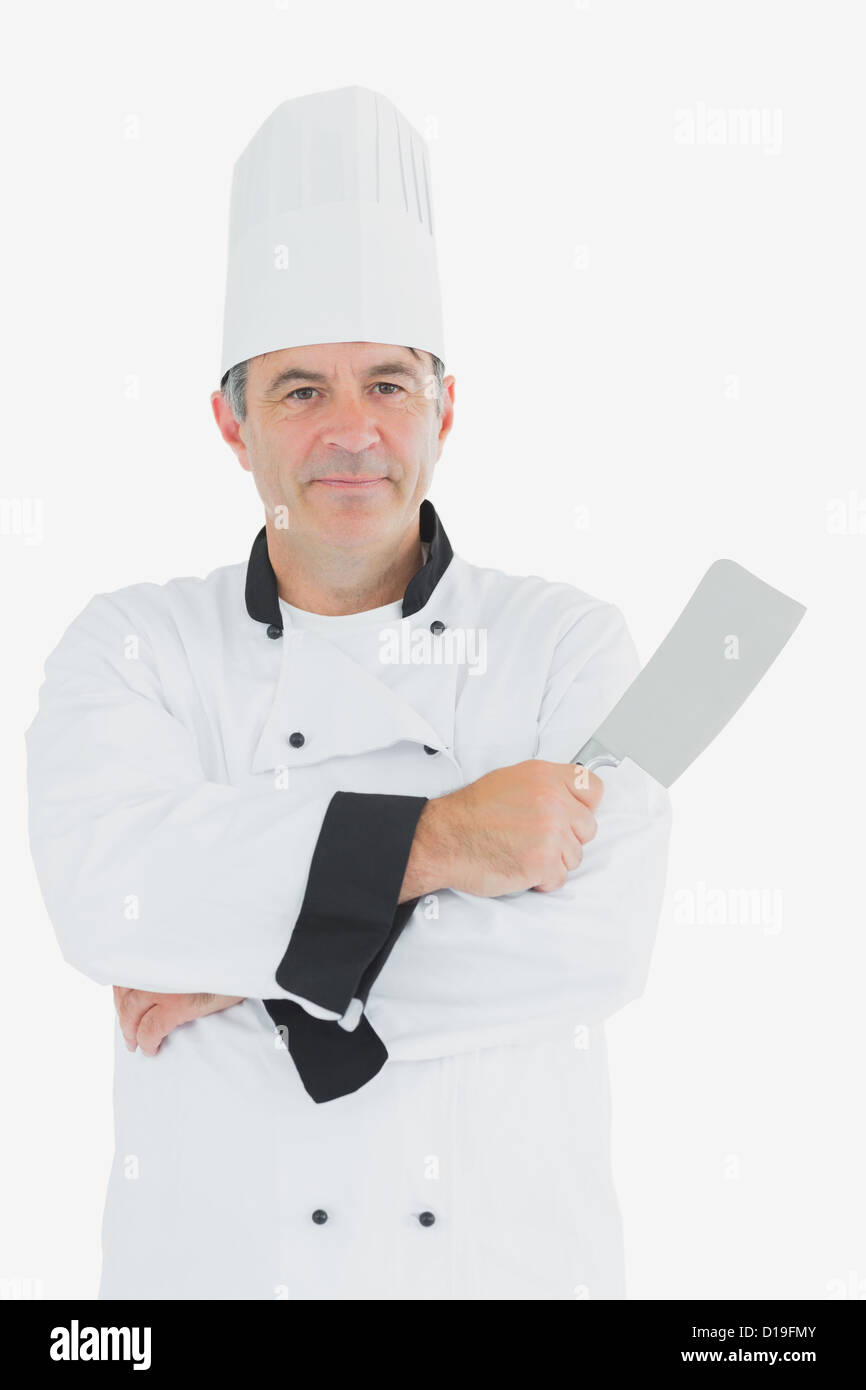 Fiducioso chef holding mannaia a base di carne Foto Stock