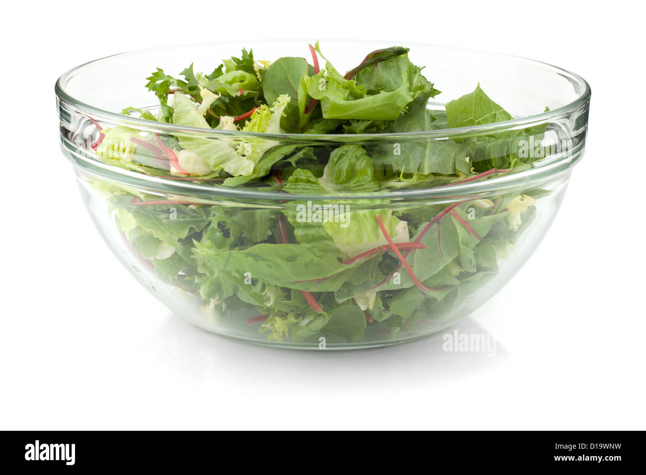 Insalata verde nella ciotola con il server per insalata Foto stock - Alamy