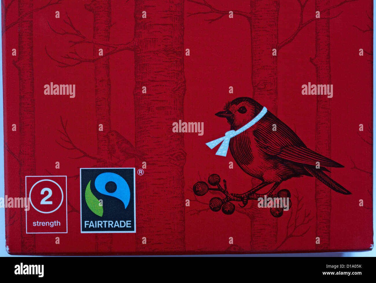Fairtrade logo e la forza di 2 simboli sulla scatola del tè di Natale - Fairtrade simbolo logo del commercio equo e solidale Foto Stock
