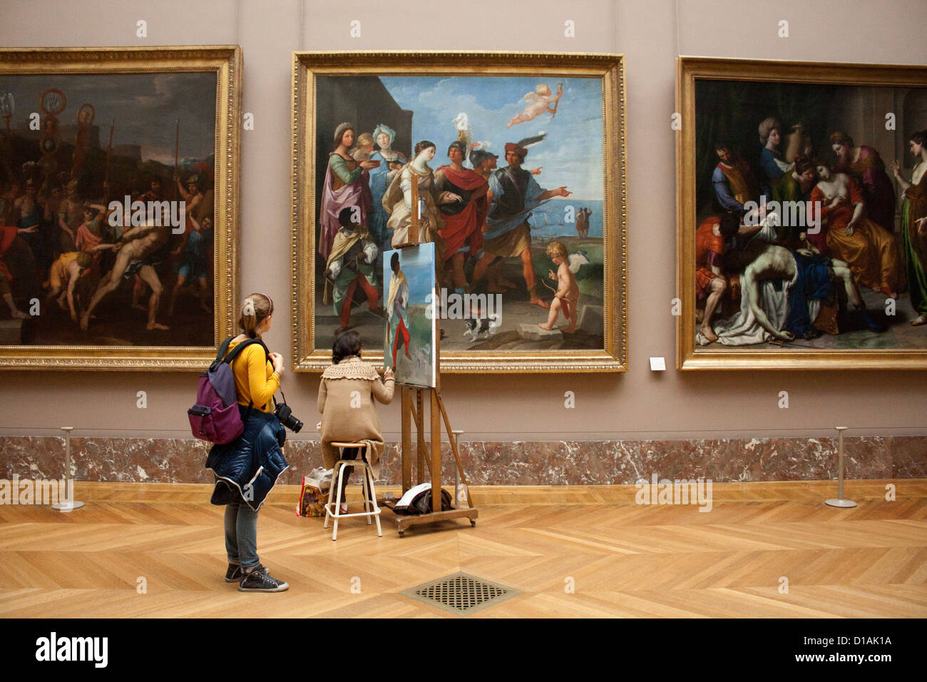 Il Louvre artisti pittura grandi opere, turistico guardando, Francia Parigi Foto Stock