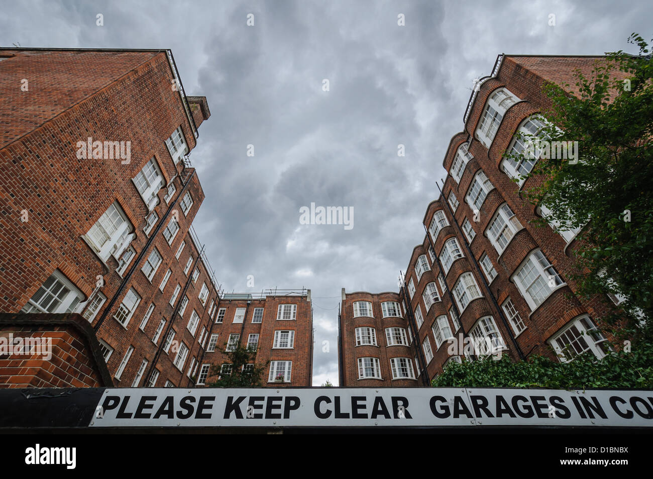 Londra tipico mattone rosso case. In Inghilterra. Foto Stock