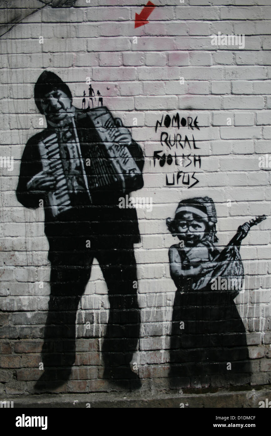 Stencil graffiti artwork da Jef Aérosol vicino a Brick Lane, Londra est Foto Stock