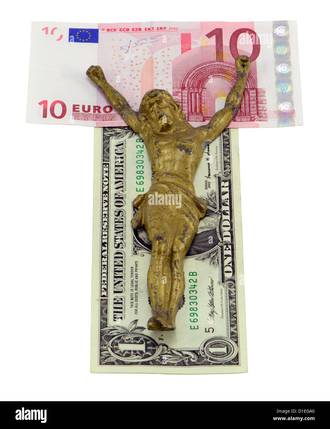 Oro Gesù crocifiggere su euro e dollaro banconote isolato su bianco. Concetto di finanza mondiale crisi. Dieci euro e dollaro bank Foto Stock