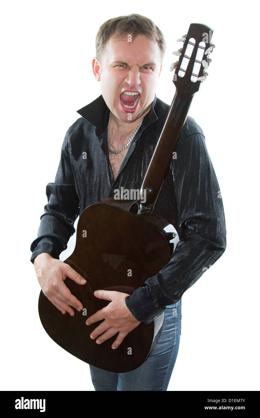 Business di successo di uomo in un elegante completo mantiene il computer portatile isolato su un fondo bianco .Affari e finanza. Più di questo Foto Stock