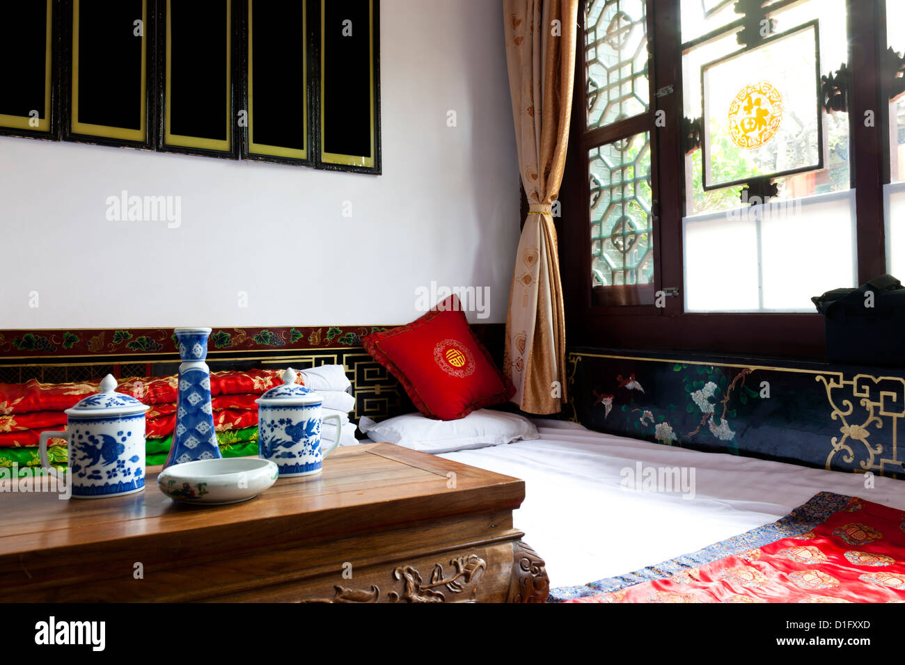 Cinese tradizionale camera da letto, di solito in campagna persone decorare home come questo. Foto Stock