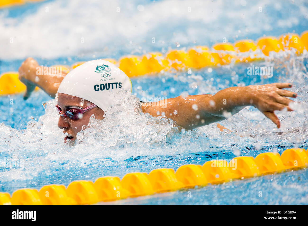 Alicia Coutts (AUS) competere Donne 100m Butterfly calore al 2012 Olimpiadi estive di Londra, Inghilterra. Foto Stock