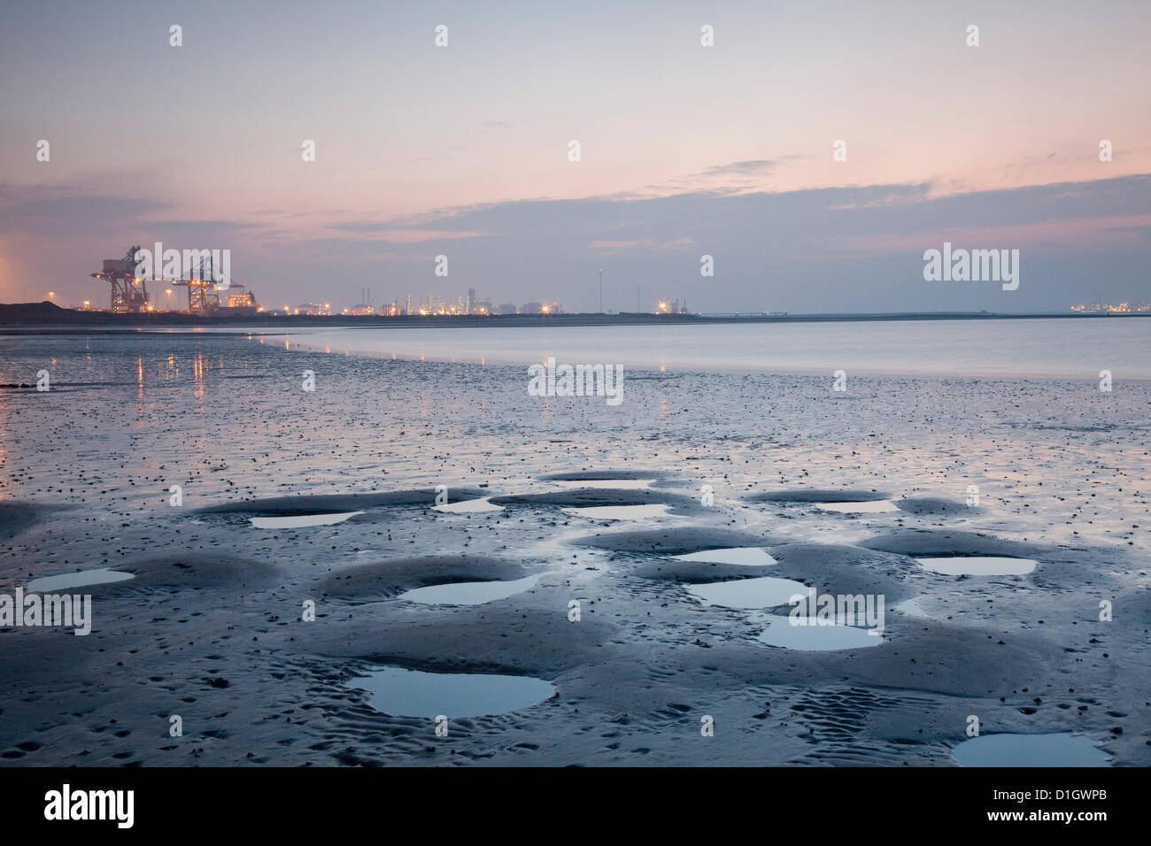 Teesside industria pesante visto da sud gare del Fiume Tees al tramonto. Foto Stock