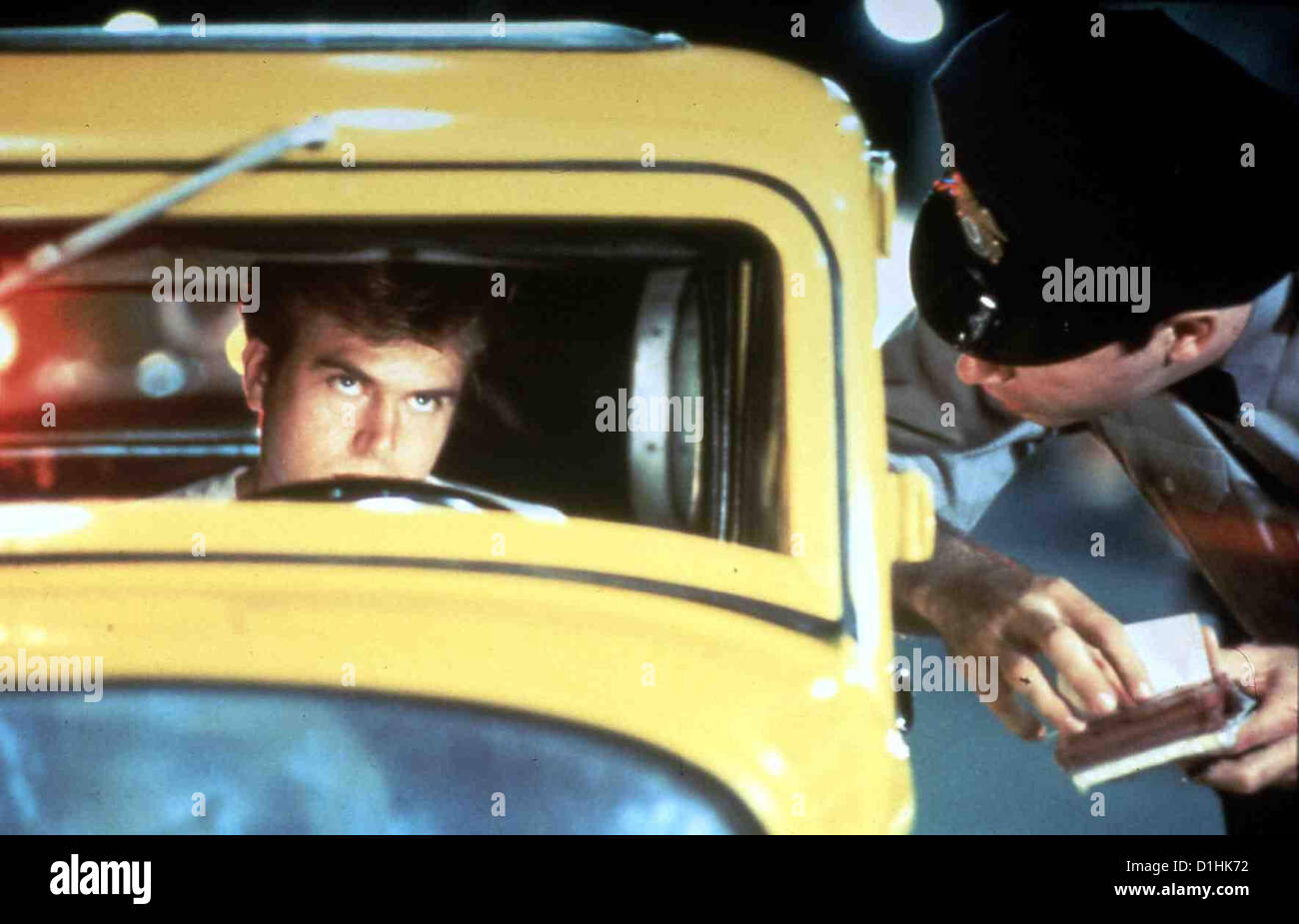 American Graffiti American Graffity Paul LeMat Draufgaenger John (Paul LeMat,l) wird in seinem 1932er Ford Deuce Coupe Foto Stock