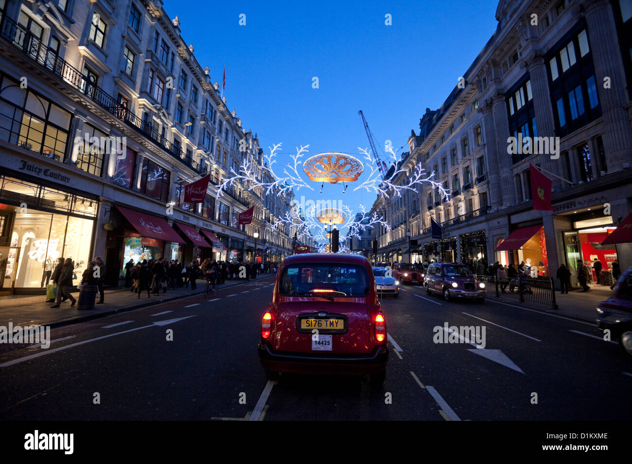 Regent street le luci di Natale e di decorazione, London, England, Regno Unito Foto Stock