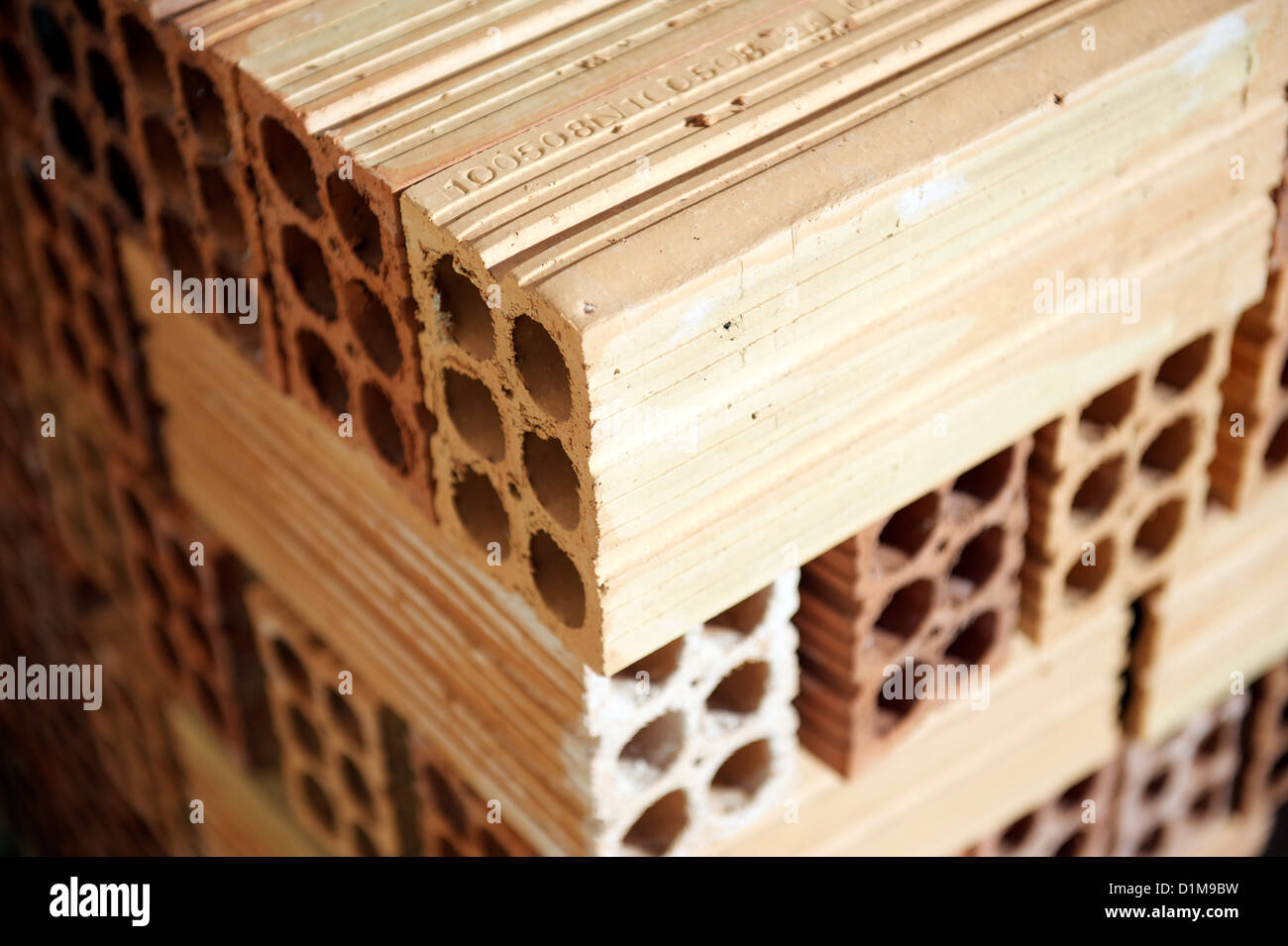 Pila di terracotta cava (spagnolo) edificio rosso dei mattoni o blocchi Foto Stock
