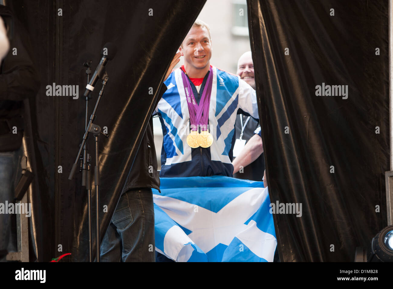 Sir Chris Hoy, scozzese campione olimpico, durante la Scottish Homecoming Parade per scozzese Olympic-vincitori di medaglie. Foto Stock