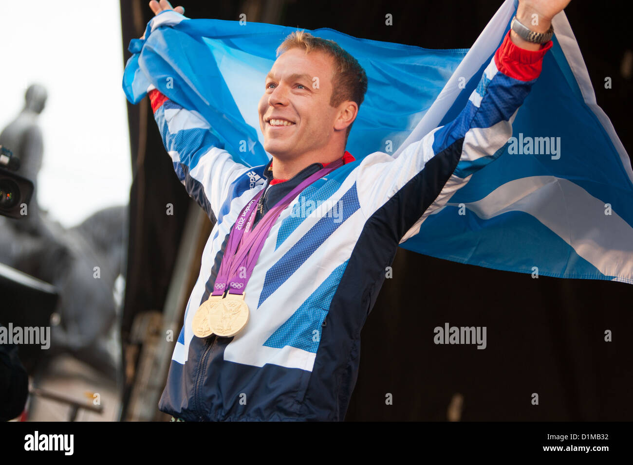 Sir Chris Hoy, scozzese campione olimpico, durante la Scottish Homecoming Parade per scozzese Olympic-vincitori di medaglie. Foto Stock