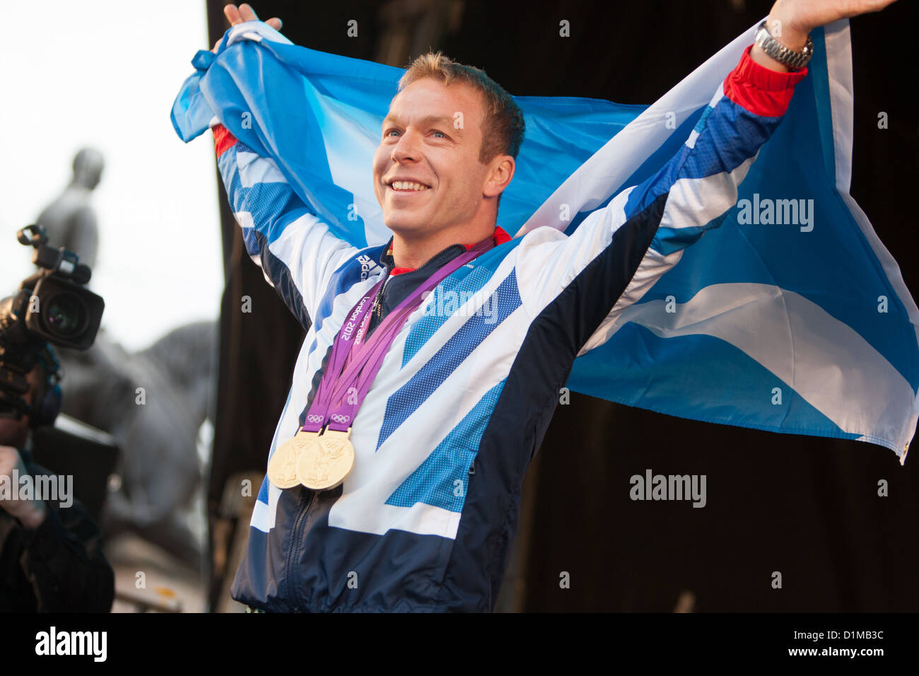 Sir Chris Hoy, scozzese campione olimpico, durante la Scottish Homecoming Parade per scozzese Olympic-vincitori di medaglie. Foto Stock