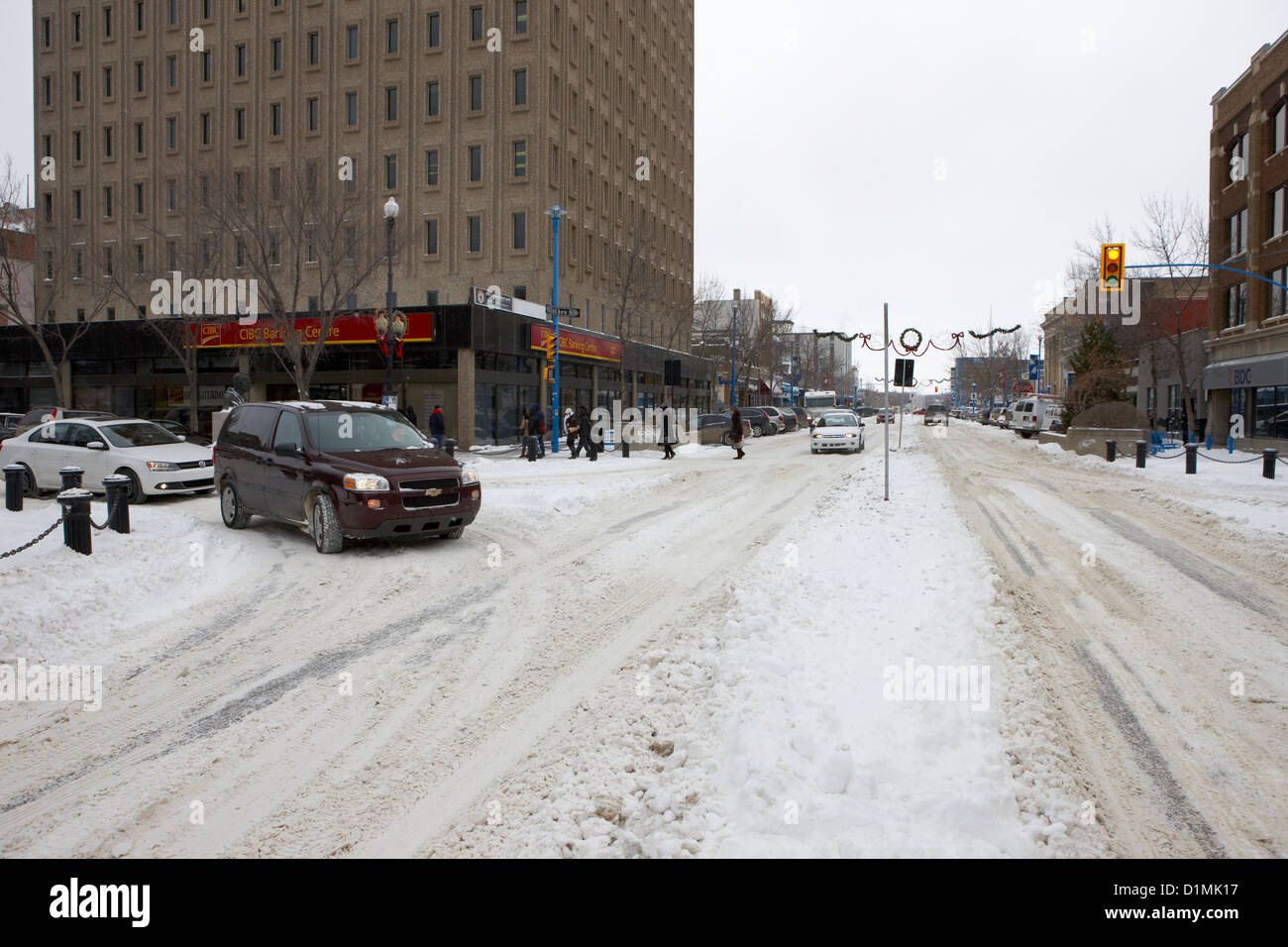 Coperta di neve strade nel centro cittadino di Saskatoon Saskatchewan Canada Foto Stock