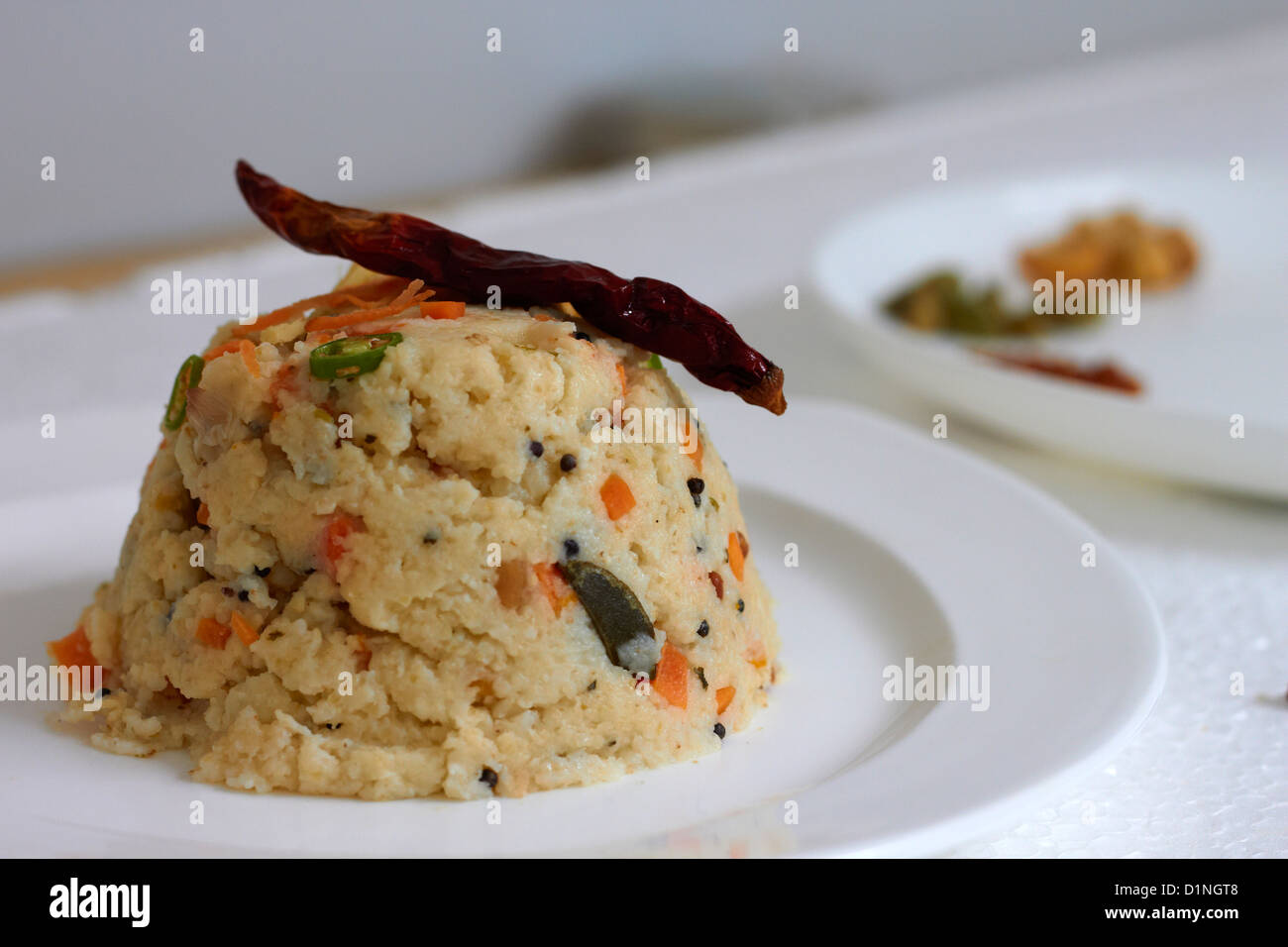 Upma è un famoso sud piatto indiano. Foto Stock