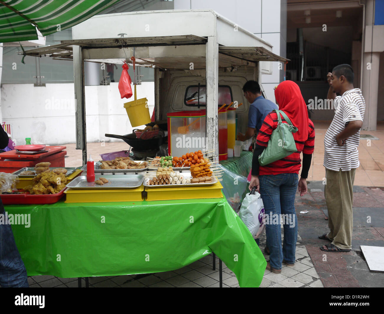 Cucina di strada venditore Kuala Lumpur Foto Stock