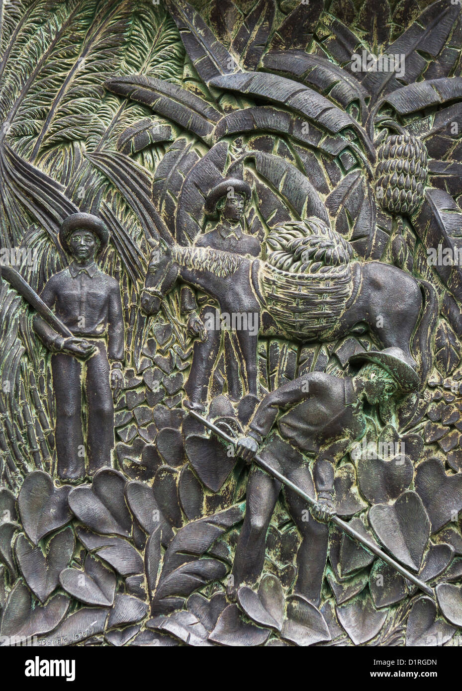 CAYEY, PUERTO RICO - Monumento di Puerto Rican contadino. Monumento al Jibaro Puertorriqueno. Mostra di placca del raccolto di banane. Foto Stock