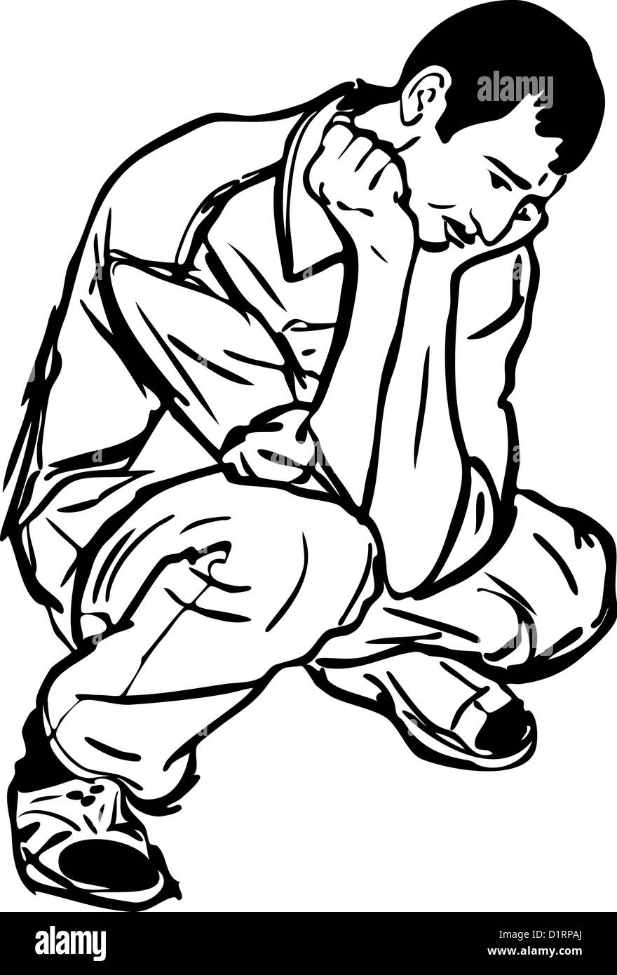 Una immagine di un giovane uomo accucciata sulla sua haunches Foto Stock