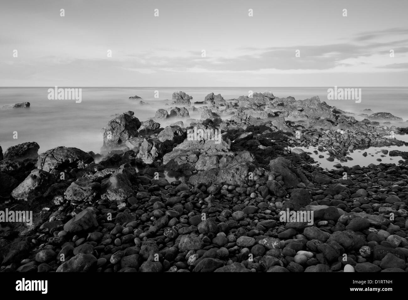 Costa Salinas rocce all'alba, una lunga esposizione con 10 arrestare il filtro ND, Tenerife, Isole Canarie, Spagna Vedi anche D1RTRJ Foto Stock
