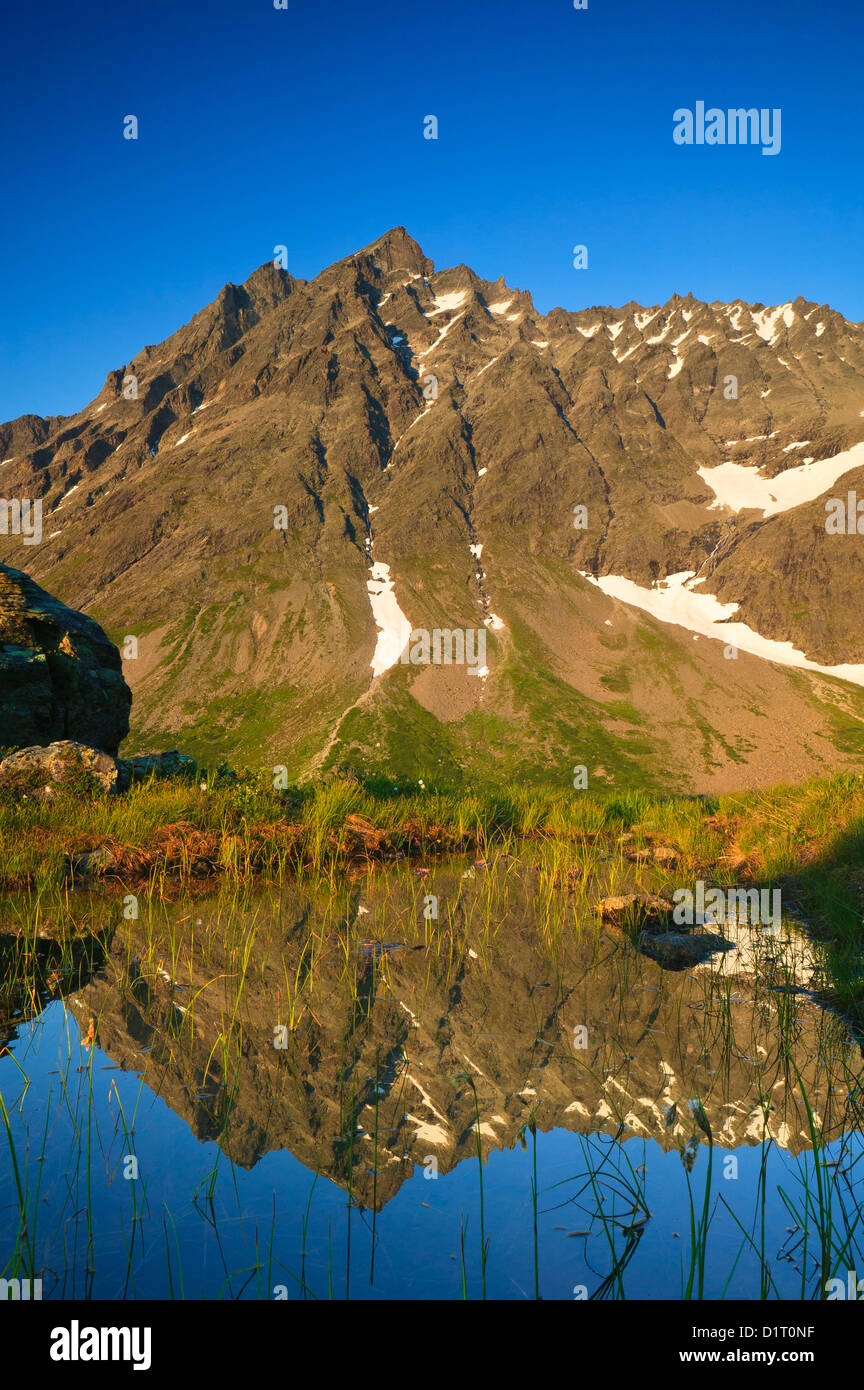 Ultima luce della sera su Store Vengetind in Vengedalen, Rauma kommune, Møre og Romsdal, Norvegia. Foto Stock