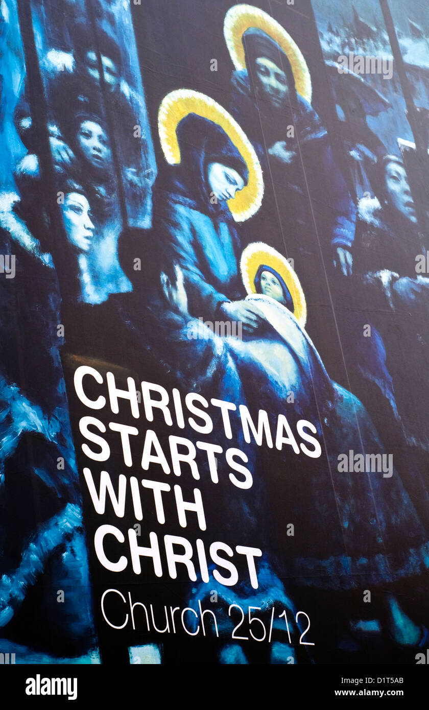 Un cartellone di promuovere la frequenza della chiesa a Natale Foto Stock