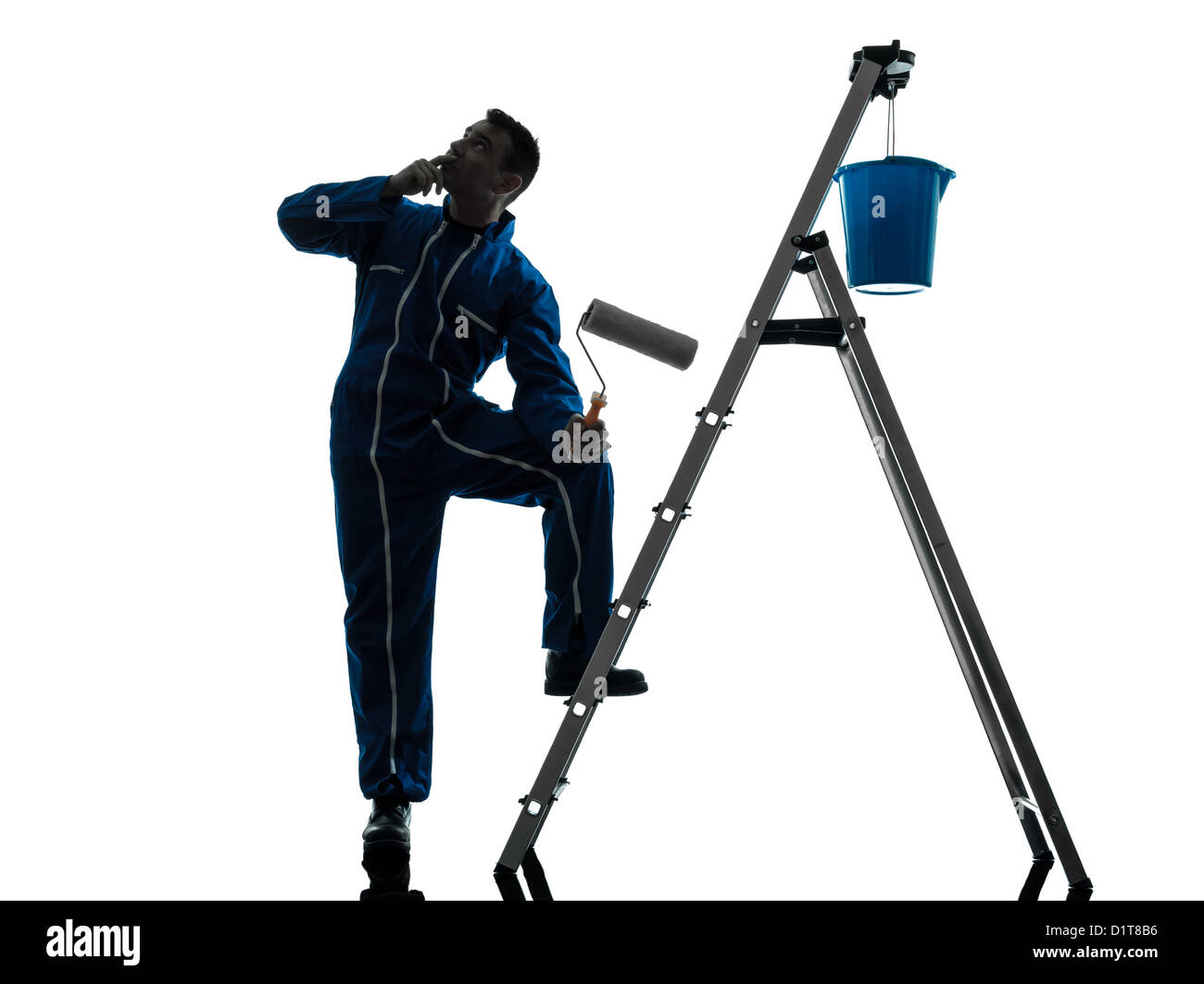 Un uomo imbianchino lavoratore silhouette in studio su sfondo bianco Foto Stock