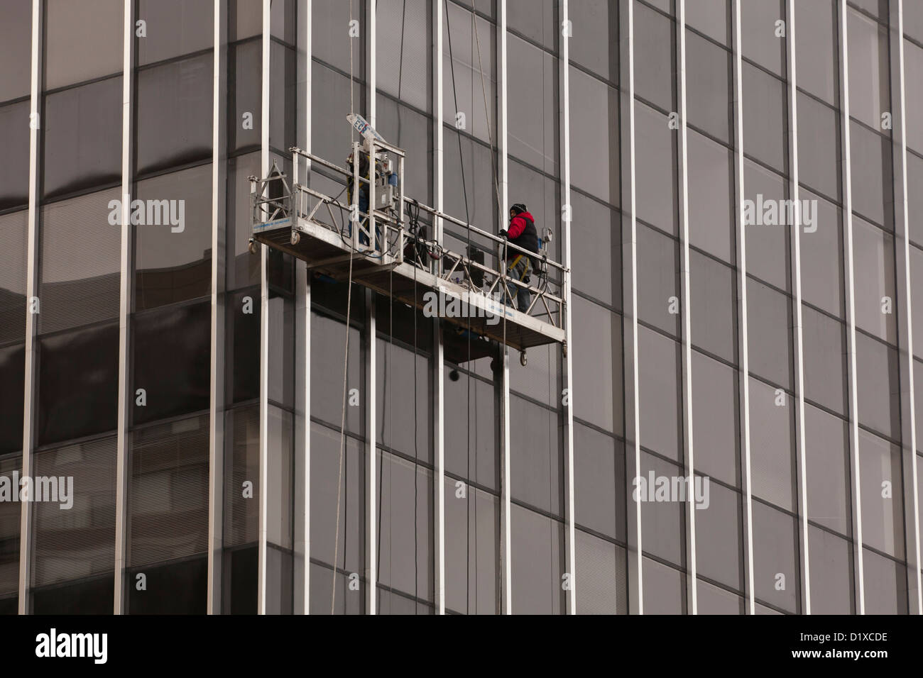 Uomini al lavoro su areale e piattaforma di lavoro - USA Foto Stock