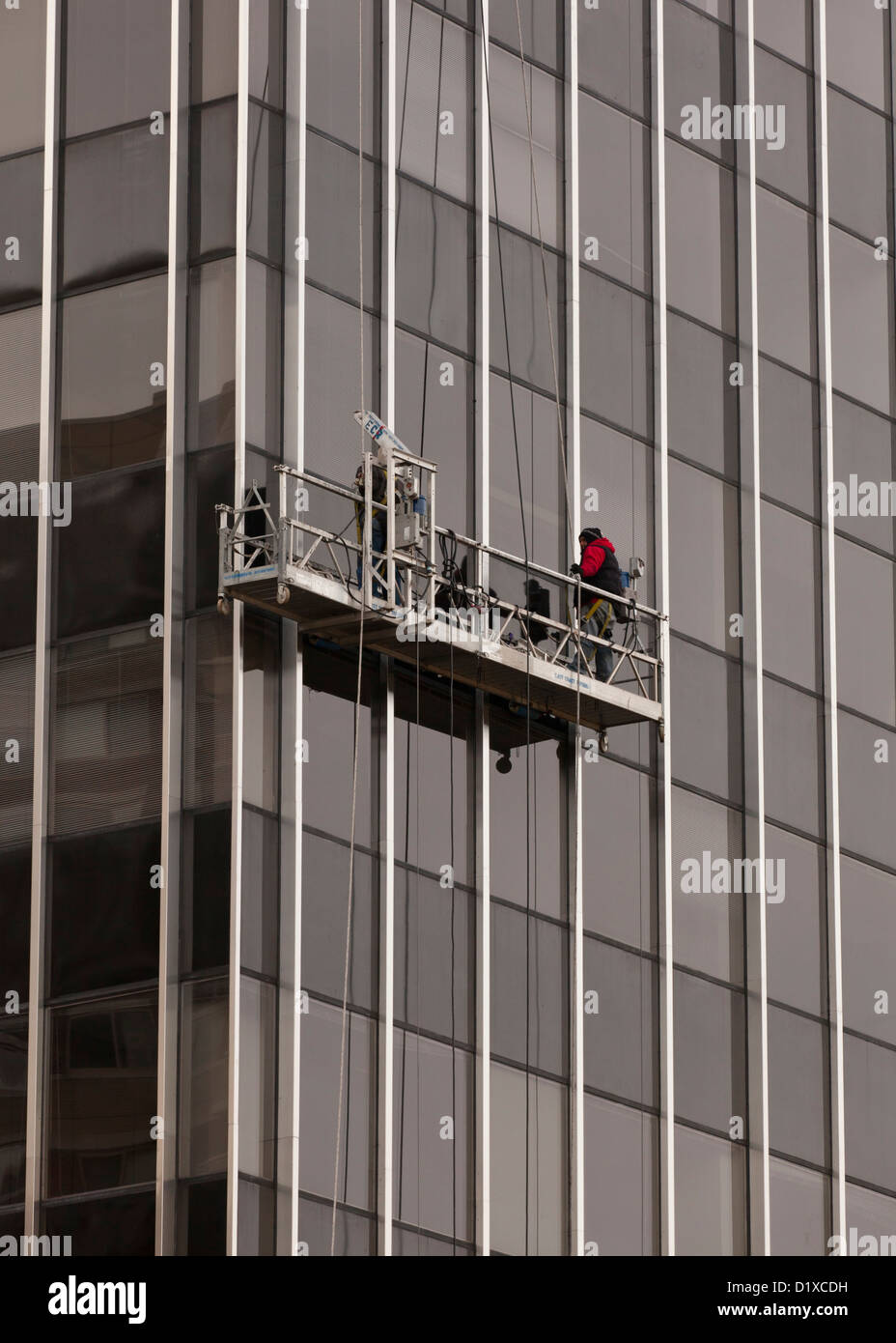 Uomini al lavoro su areale e piattaforma di lavoro - USA Foto Stock