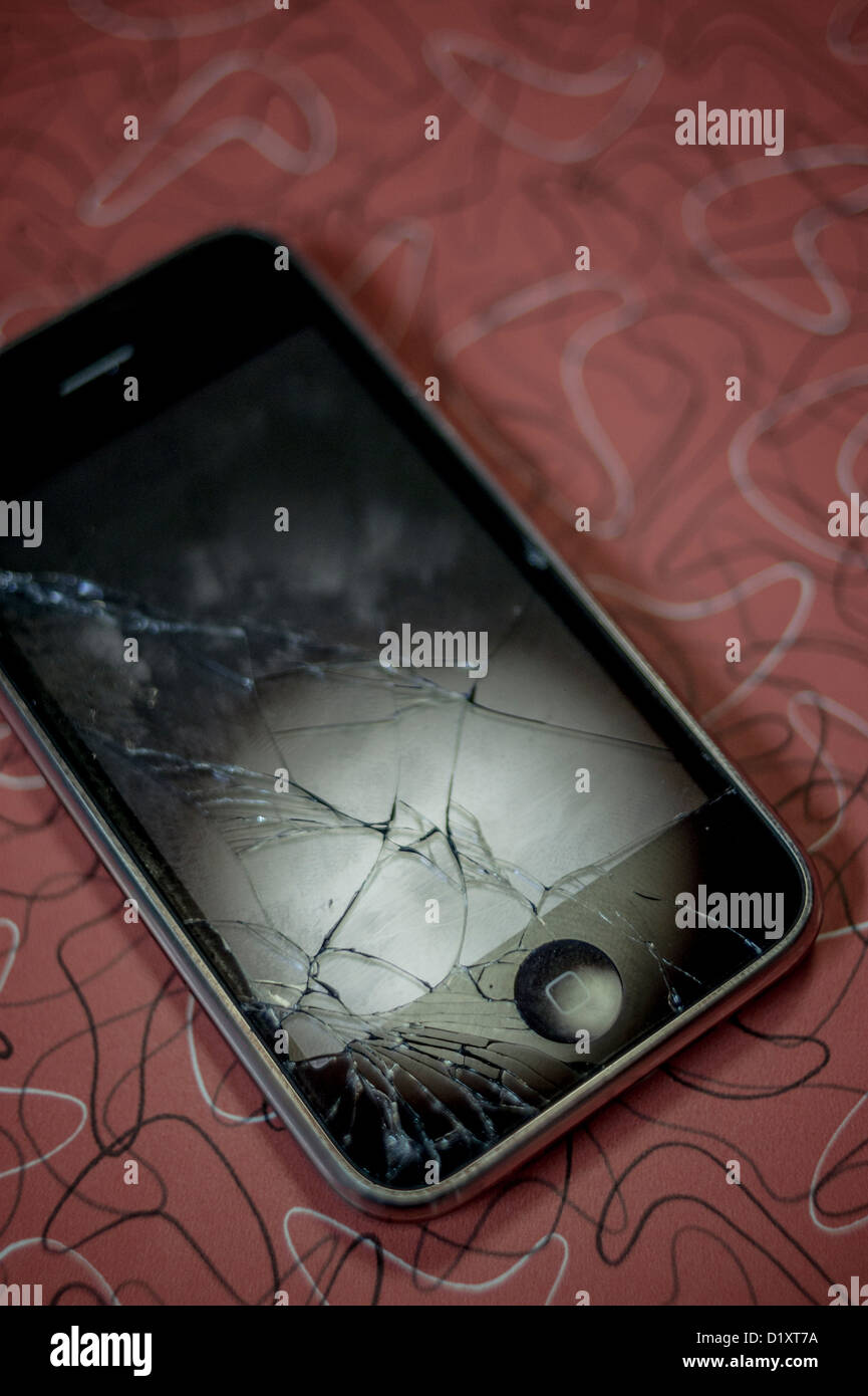 Apple iPhone con schermo rotto Foto Stock