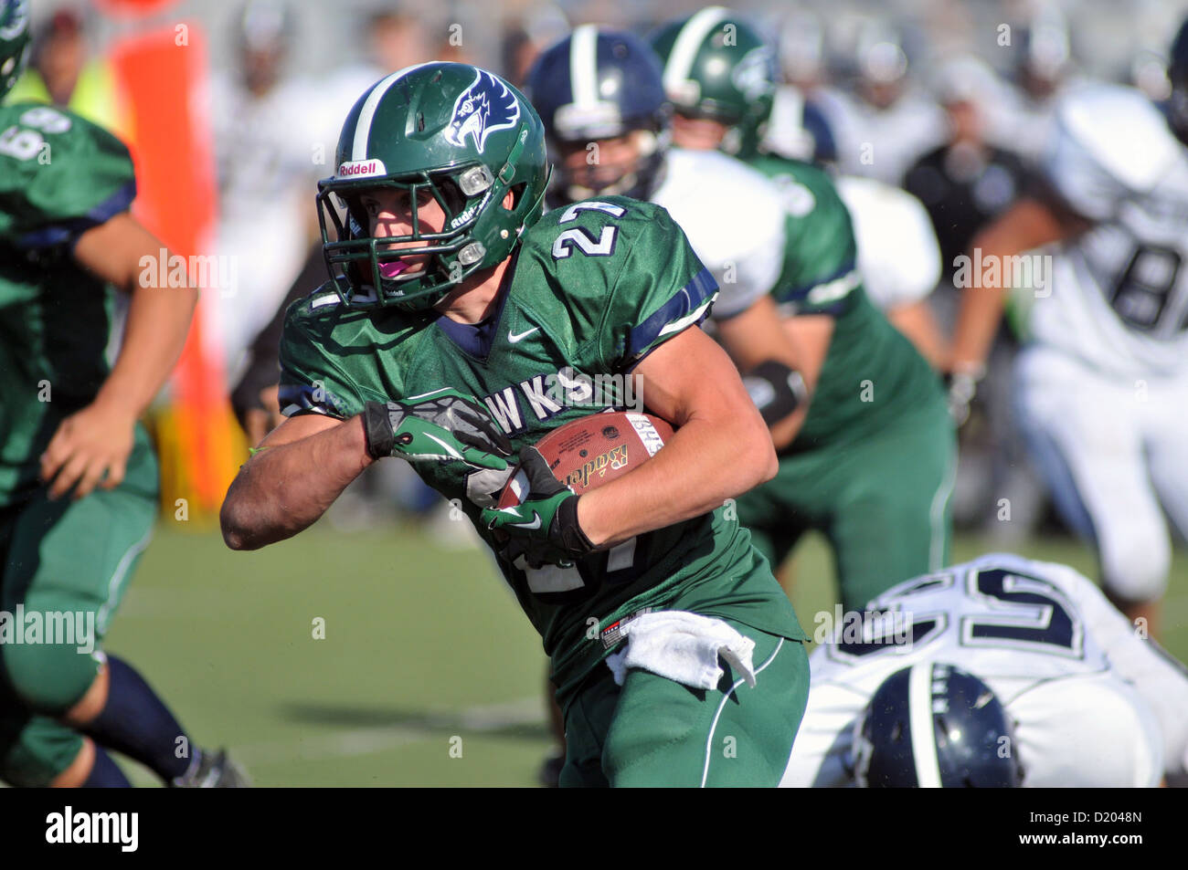 Il calcio di alta scuola running back si ritaglia un yardage. Stati Uniti d'America. Foto Stock