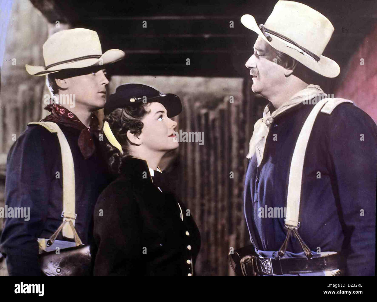 Der Teufelshauptmann indossava nastro giallo John Agar, Joanne Dru, John Wayne Leutnant Cohill (John Agar) und capitano Foto Stock