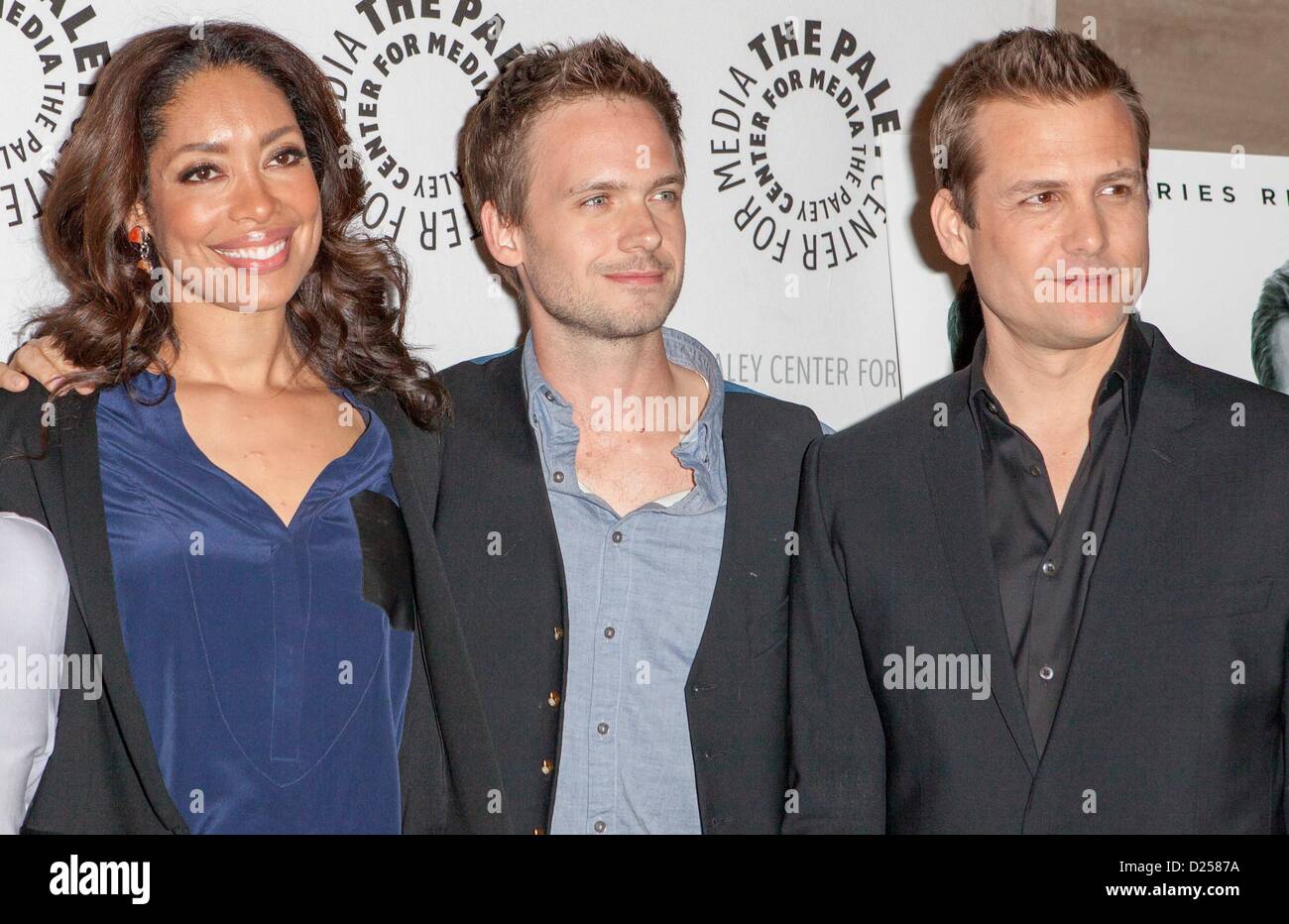 Beverly Hills, in California, Stati Uniti d'America. 14 gennaio 2013. Gina Torres, Patrick J. Adams, Gabriel Macht di presenze per la Paley Centre for Media presenta una serata con abiti, Paley Centre for Media, Beverly Hills, CA, 14 gennaio 2013. Foto di: Emiley Schweich/Everett Collection Foto Stock