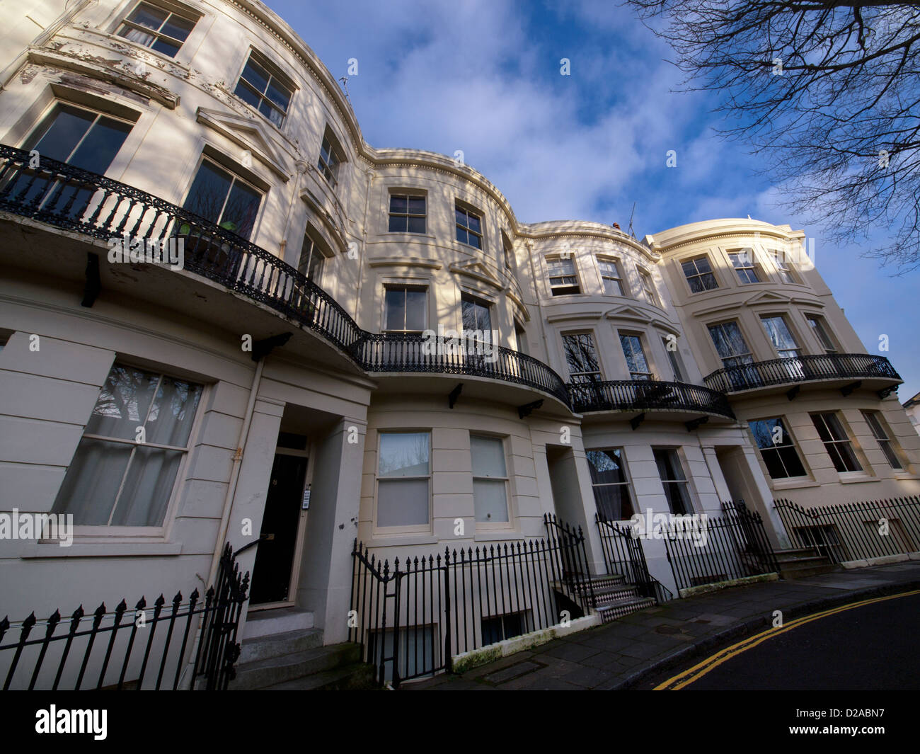 Una terrazza di prua case con facciata in powis square,Brighton. Foto Stock