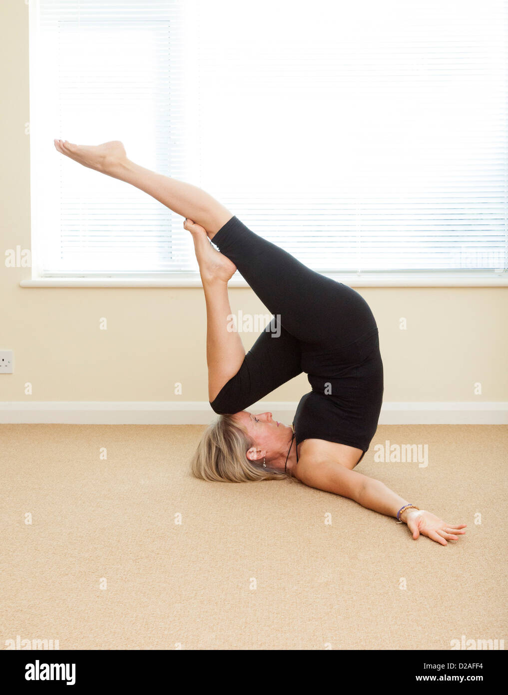 Lo yoga pone - libellula Foto Stock
